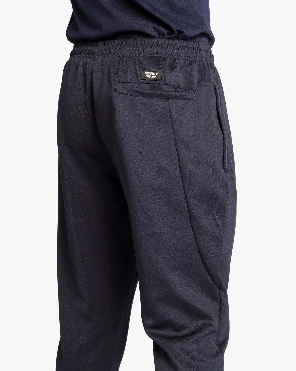 Soviet men's Aero skinny leg pants in dark fabric, showing a close-up of the slim fit design and waistband detail.