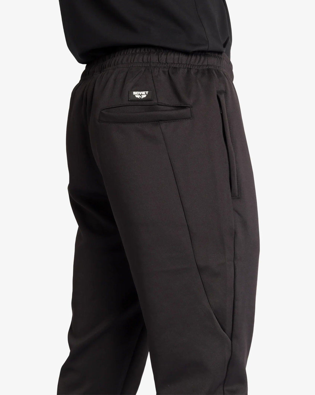 Soviet Mens Aero skinny leg pants in dark fabric, shown folded on a white background, casual men's apparel style.