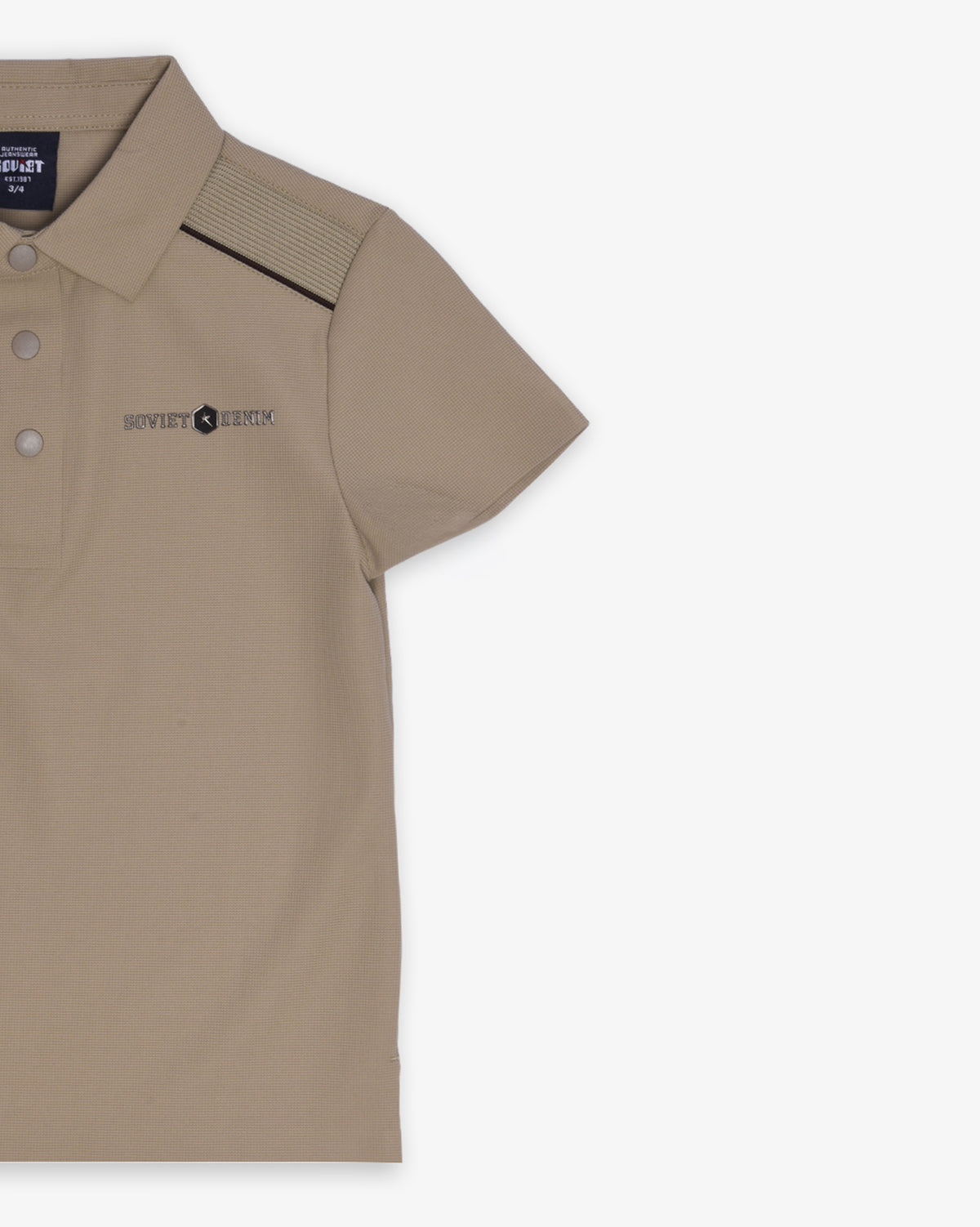 Boy wearing Soviet Boys McQueen short sleeve slinky golf shirt in silver sage, casual sportswear apparel.