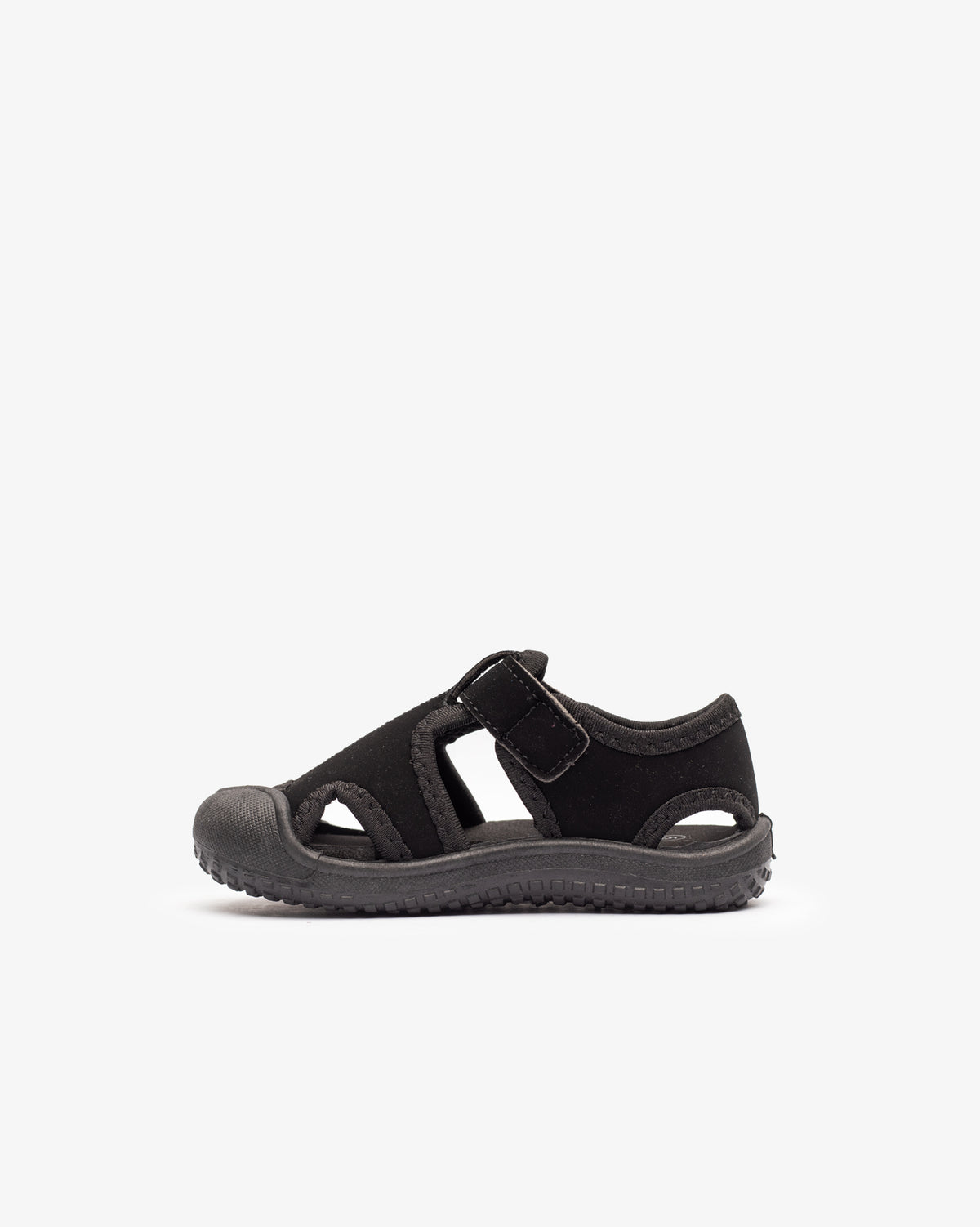 Black neoprene Velcro sandals for infants, Soviet Singh brand, showing the closed-toe design and adjustable straps.