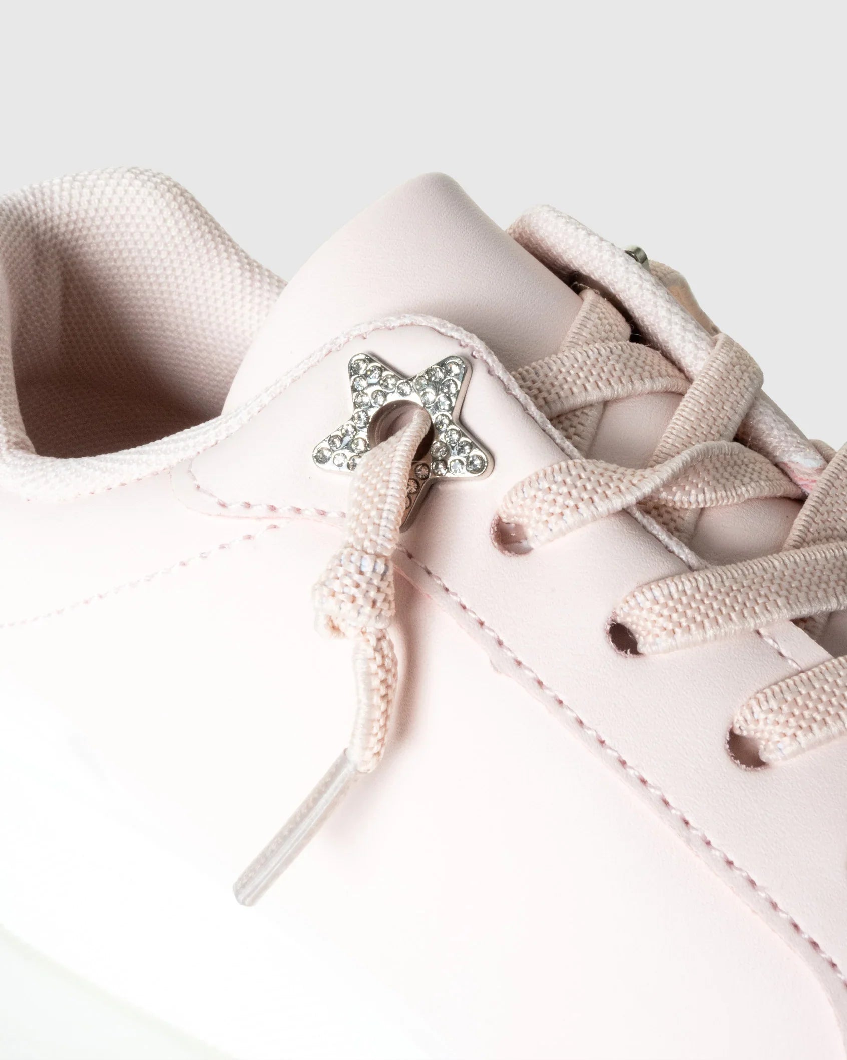 Kids Allie Pink Pu star detail sneaker close up