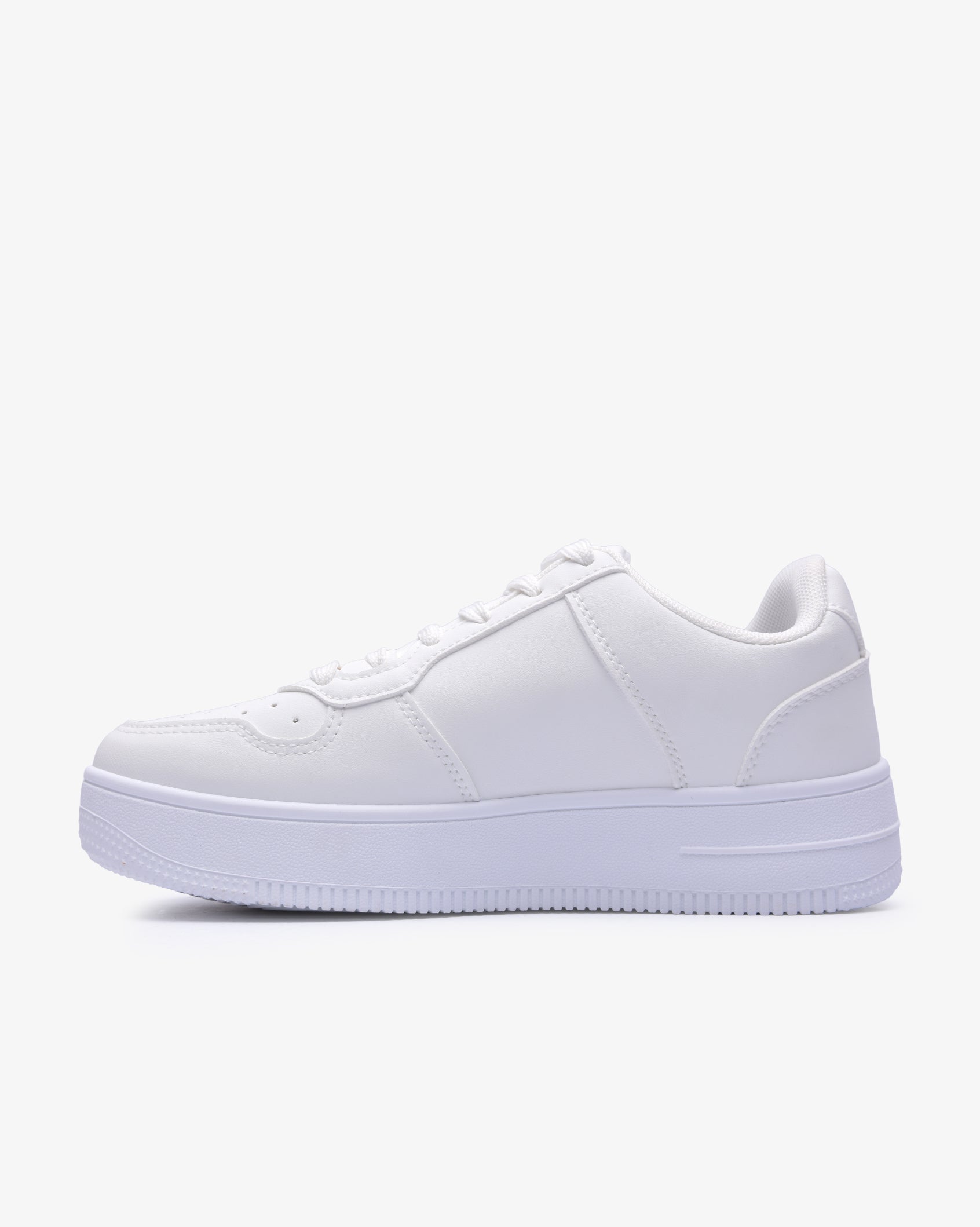 White PU low-top sneaker profile with lace-up front and cushioned sole