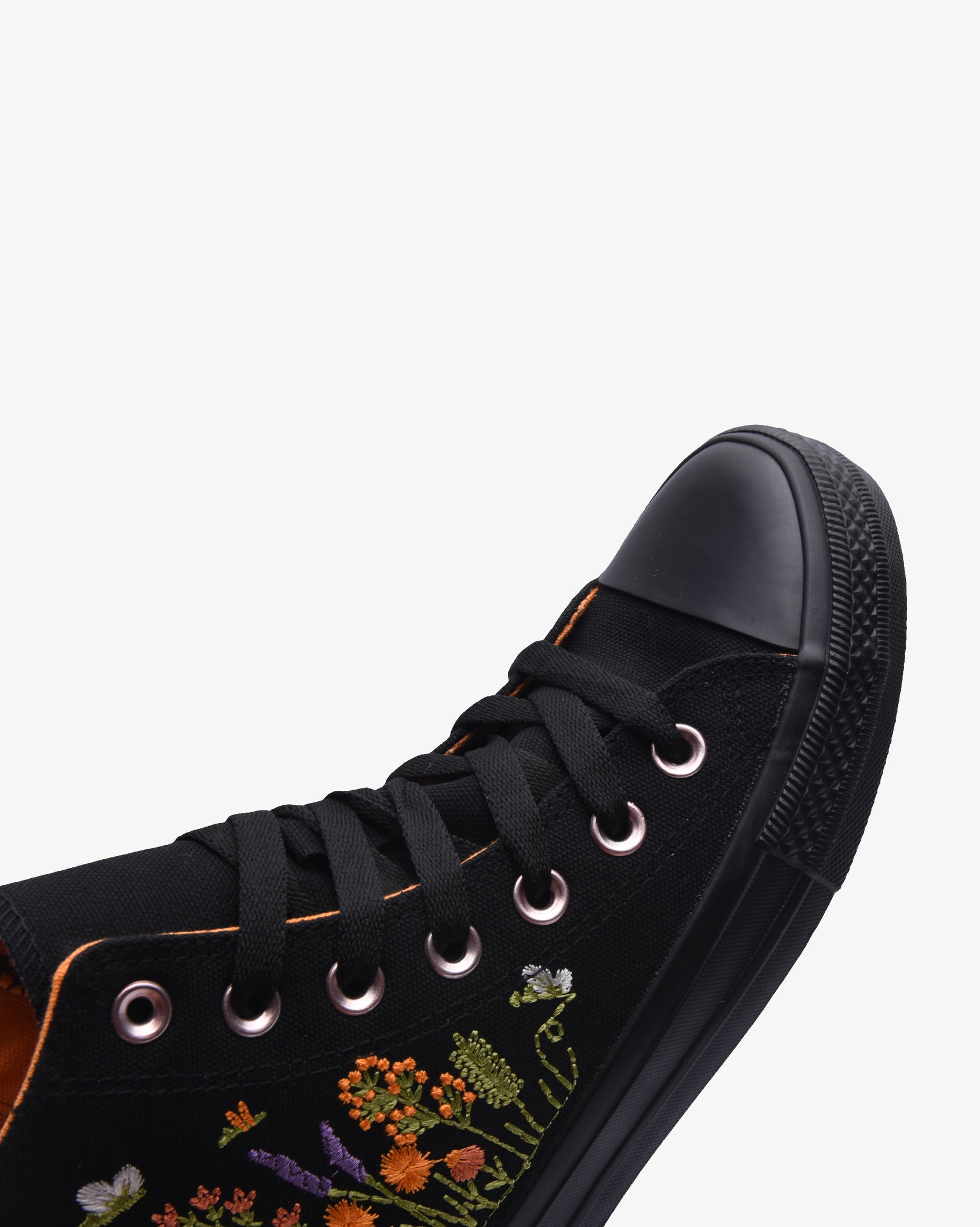Ladies Soviet Viper Floral Hi Cut Canvas footwear with black floral pattern, showcasing stylish high-top sneakers.