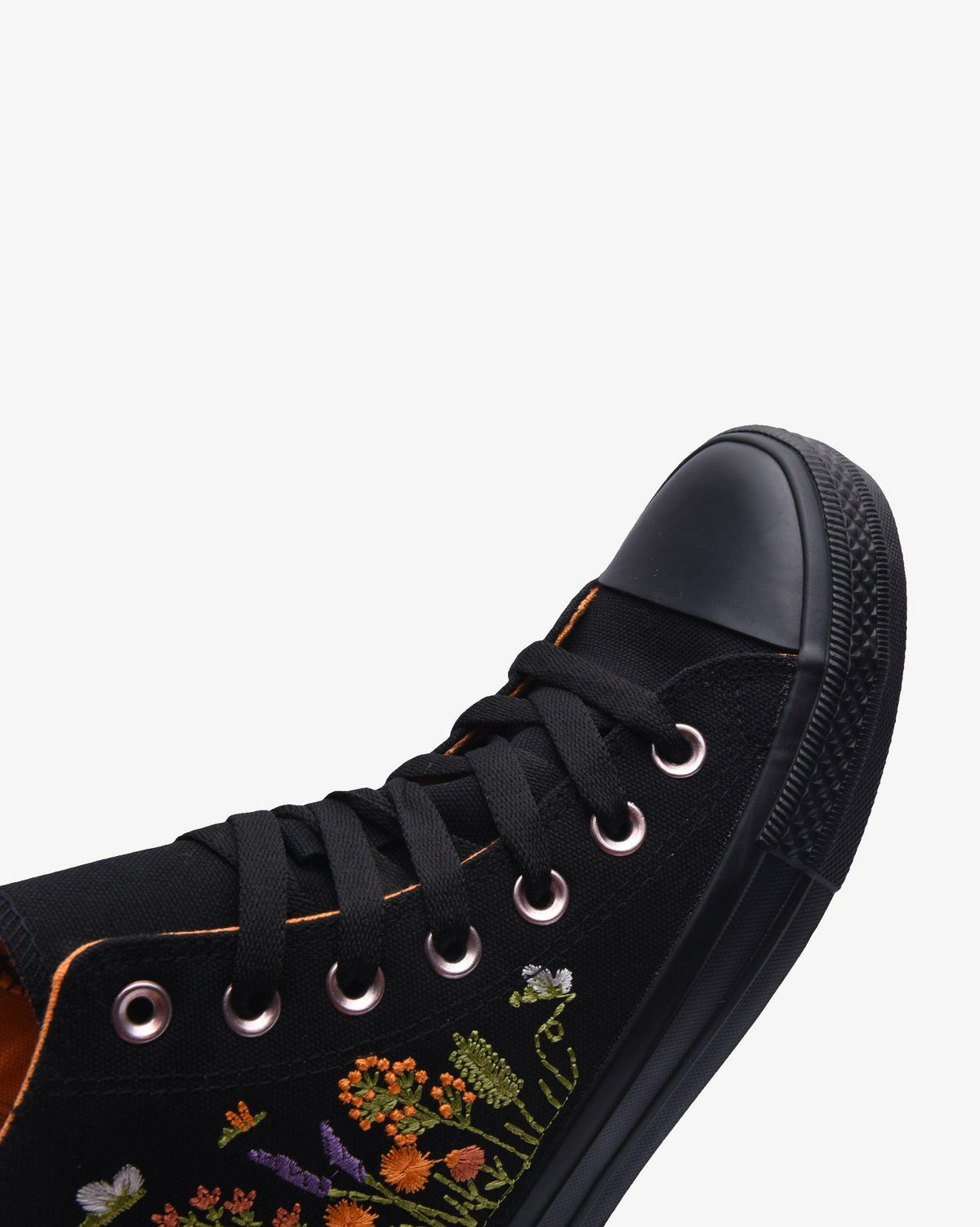 Ladies Soviet Viper Floral Hi Cut Canvas footwear with black floral pattern, showcasing stylish high-top sneakers.