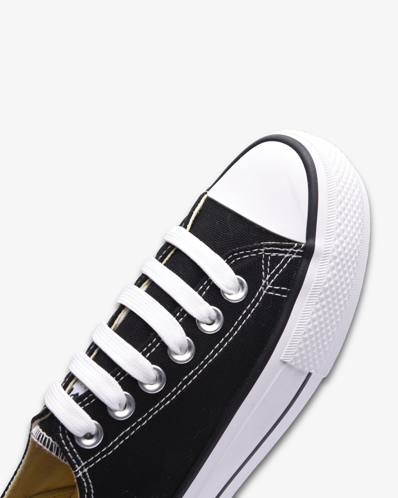 Black Soviet Ladies Viper Platform sneakers with vulcanized low cut canvas design and 4cm platform height.