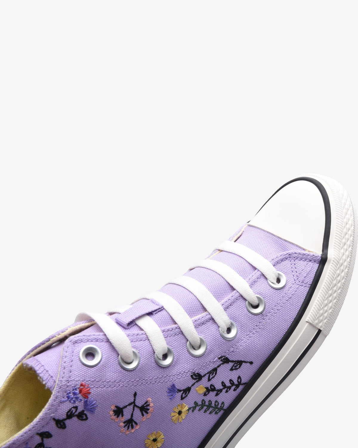 Ladies Soviet Viper Floral hi-cut canvas footwear in lilac and cream with a vibrant floral pattern.