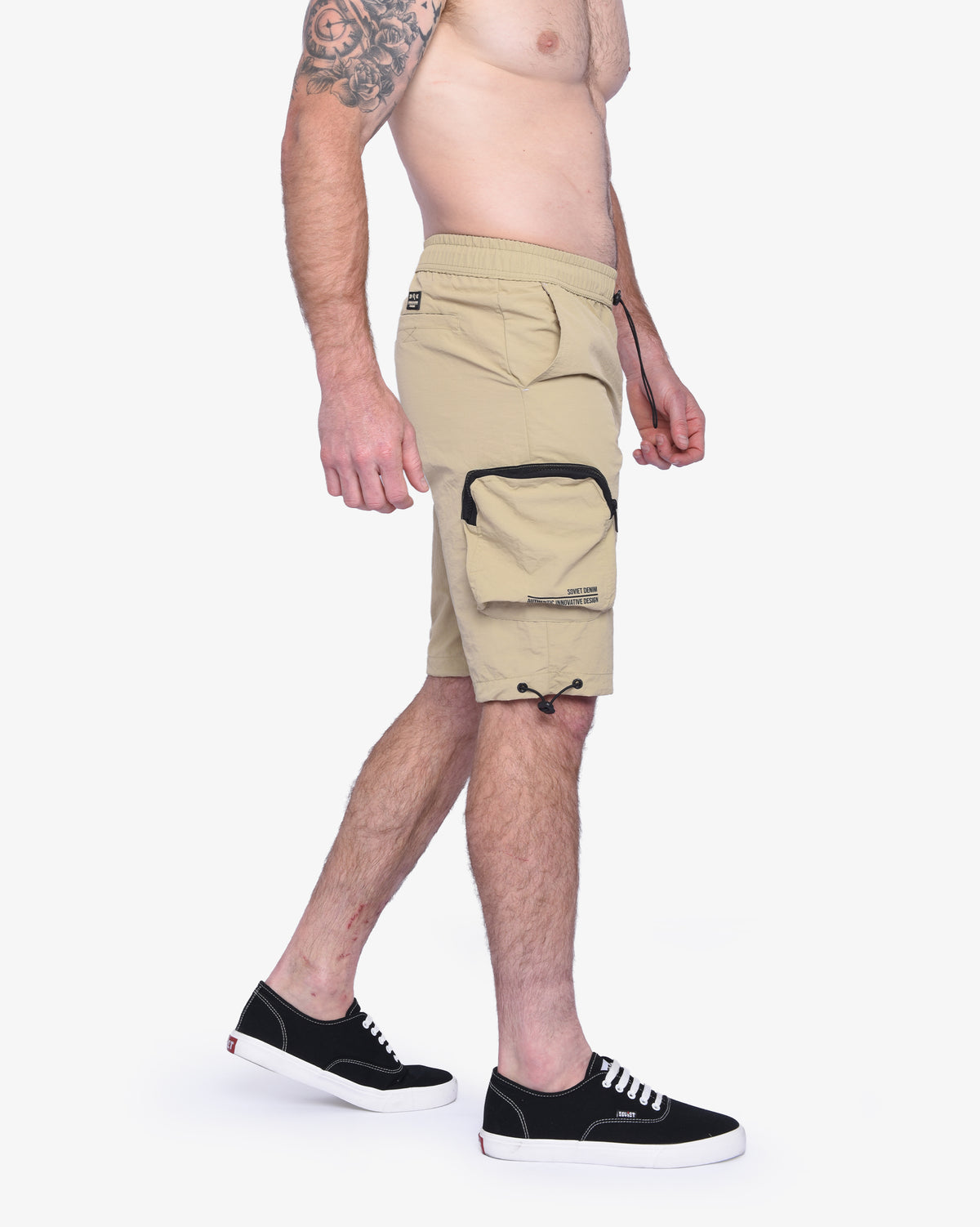 Men's Soviet Baraka nylon track shorts in khaki, featuring athletic design and comfortable fit, ideal for active wear.