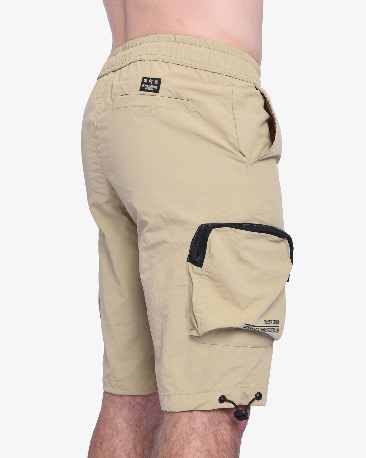 Men's Soviet Baraka nylon track shorts in khaki color, athletic apparel with a relaxed fit and drawstring waistband.