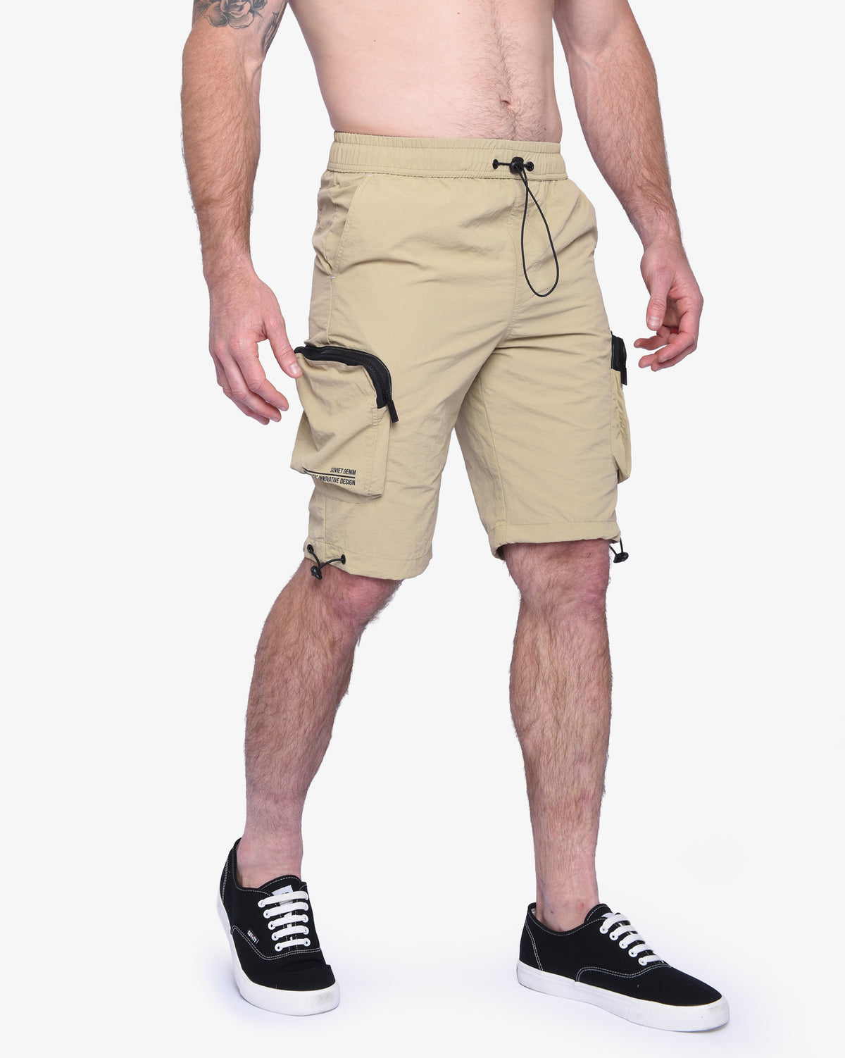 Men's Soviet Baraka nylon track shorts in khaki, featuring a comfortable fit and athletic design, perfect for sports and casual wear.