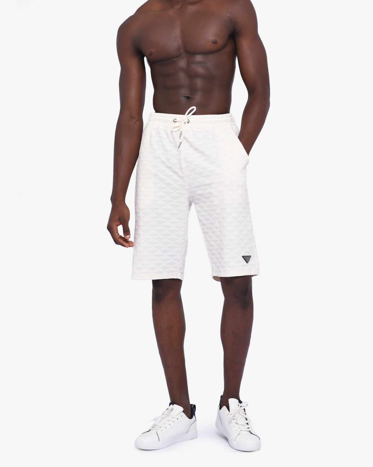 Men's Soviet Ford track shorts in cream color, lightweight athletic apparel with a comfortable fit and sporty design.