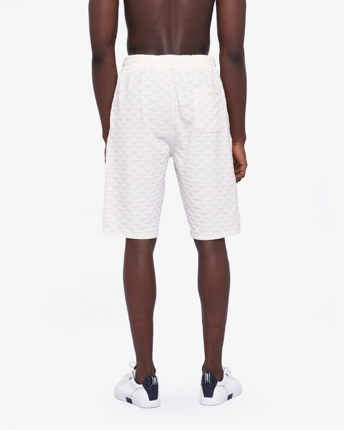 Men's Soviet Ford track shorts in cream color, lightweight athletic apparel with a comfortable fit and sporty design.