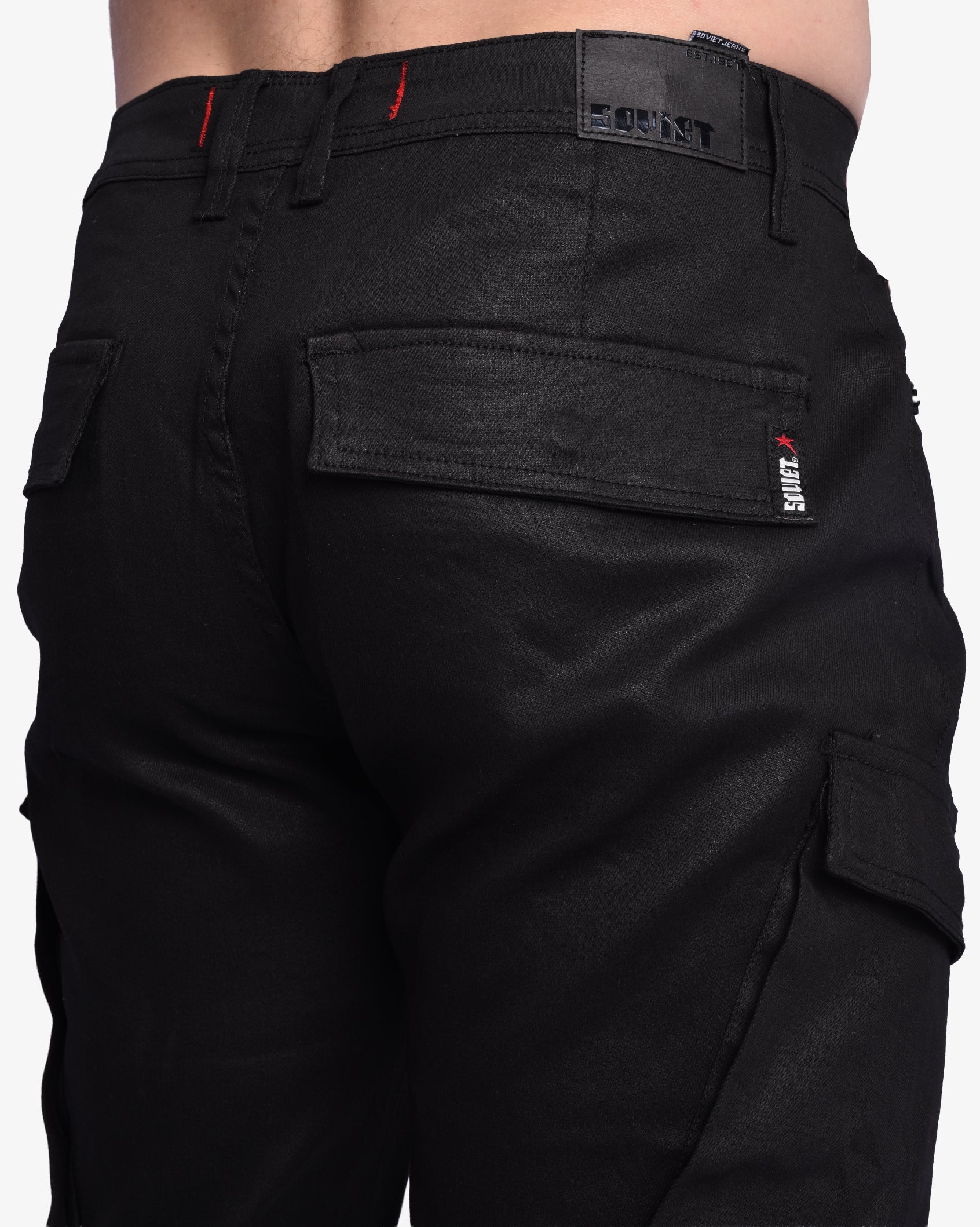 Soviet Mens Jerry wax finish denim cargo pants in black, featuring multiple pockets and a rugged, stylish design.