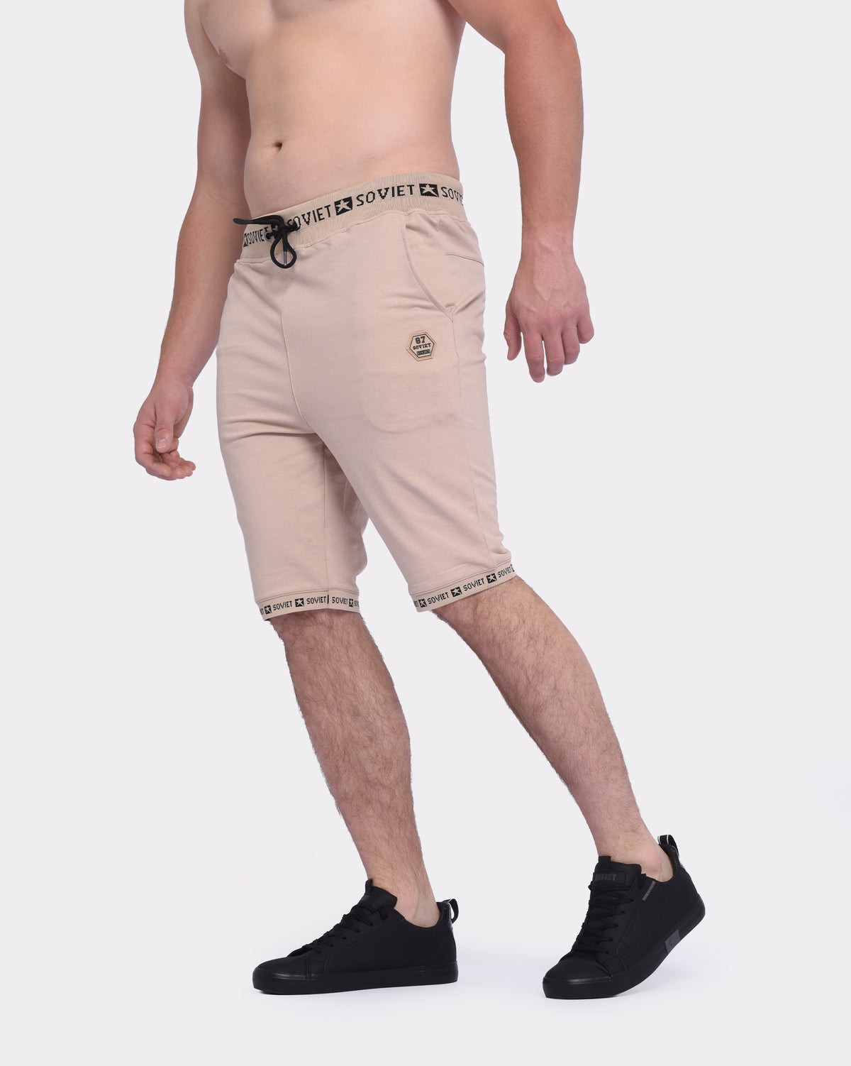 Men's Soviet Keeper track shorts in black with side stripes, featuring an elastic waistband and athletic fit for active wear.