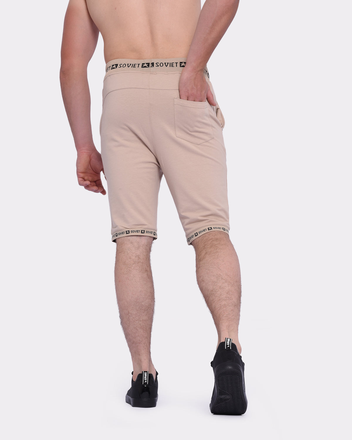 Soviet men's Keeper track shorts in black with white side stripes, lightweight athletic apparel for running or training.