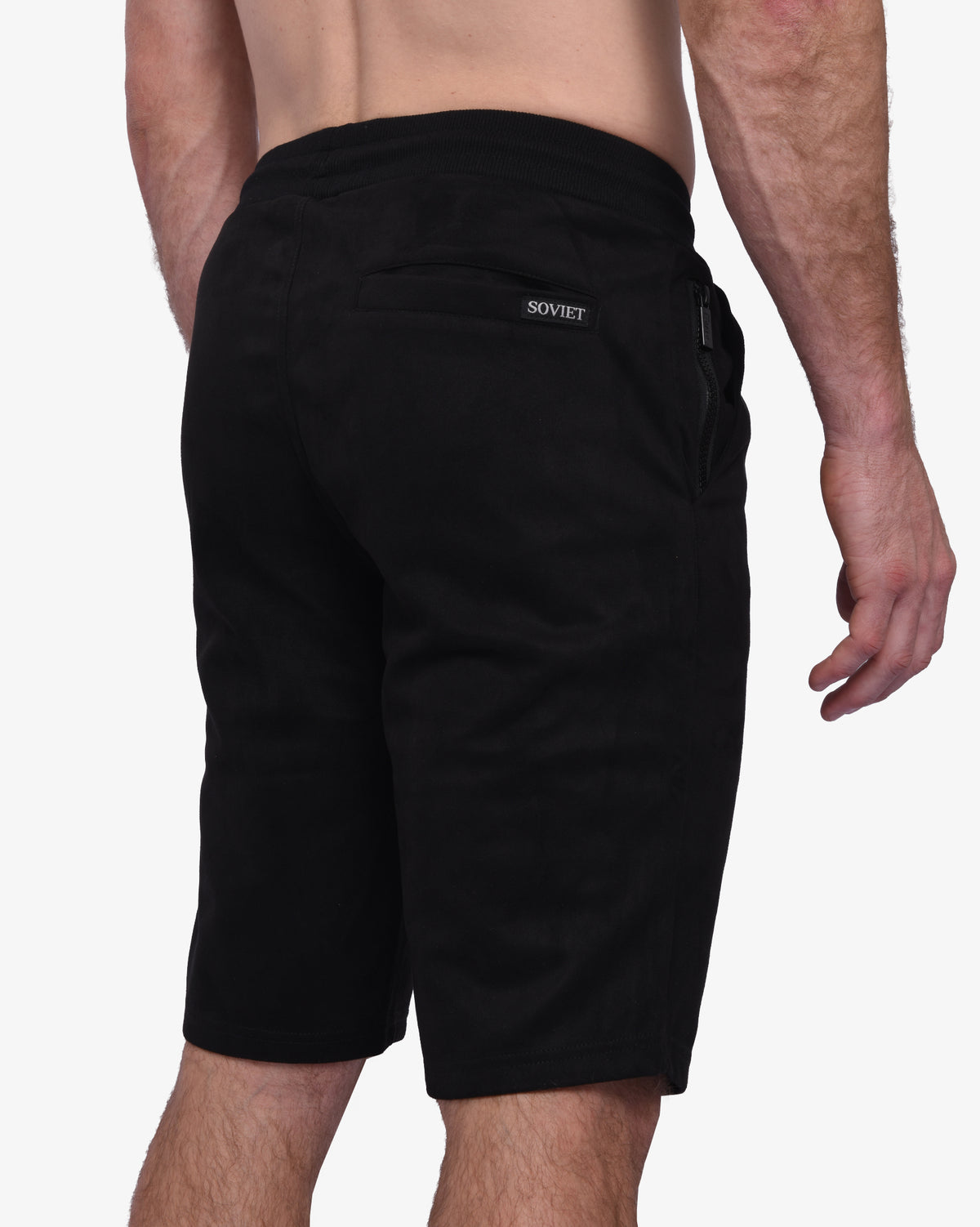 Black men's velvety track shorts with Soviet brand logo, designed for comfortable athletic wear.
