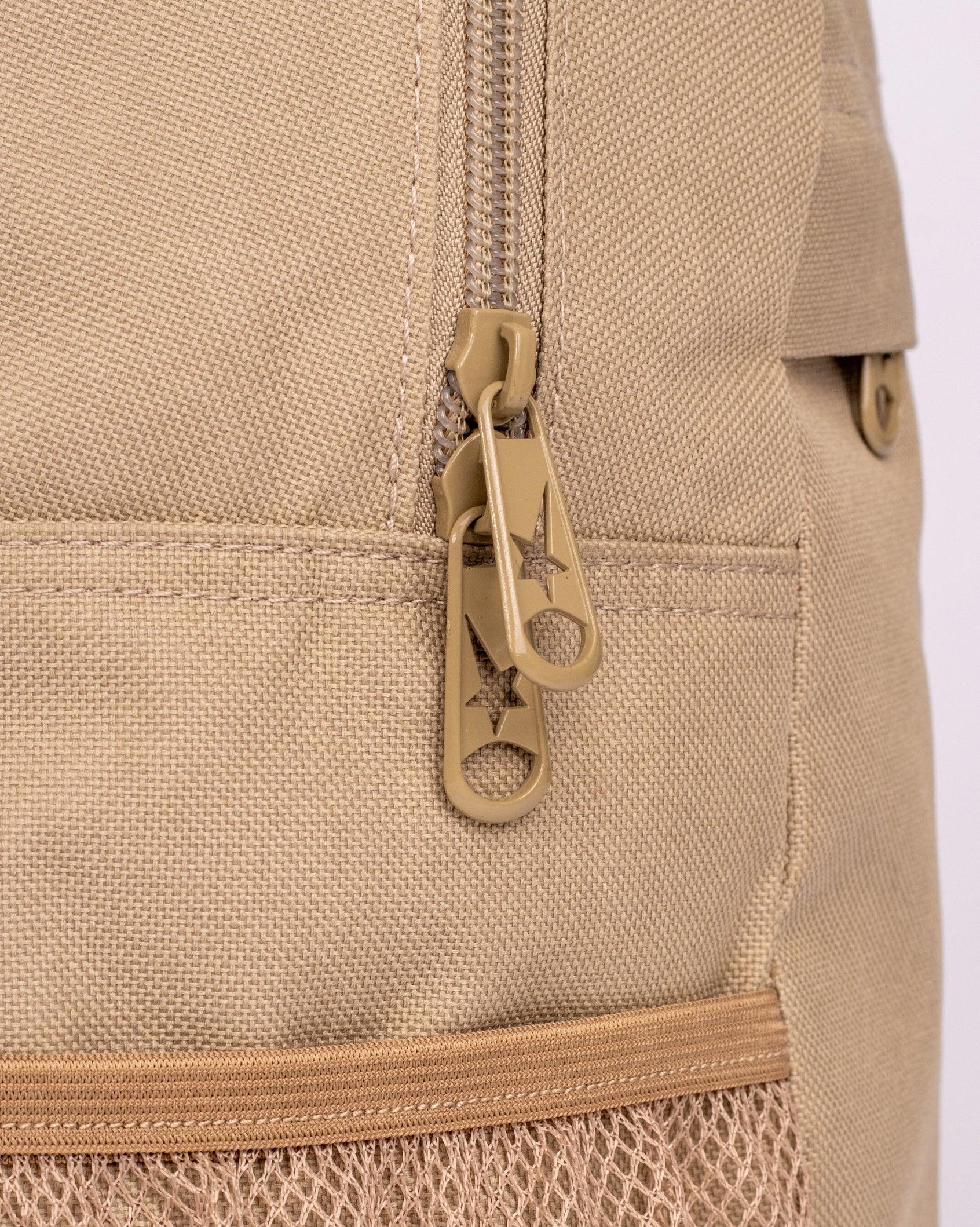 Soviet Ray backpack in sage grey with adjustable straps, multiple compartments, and durable fabric for everyday accessories.