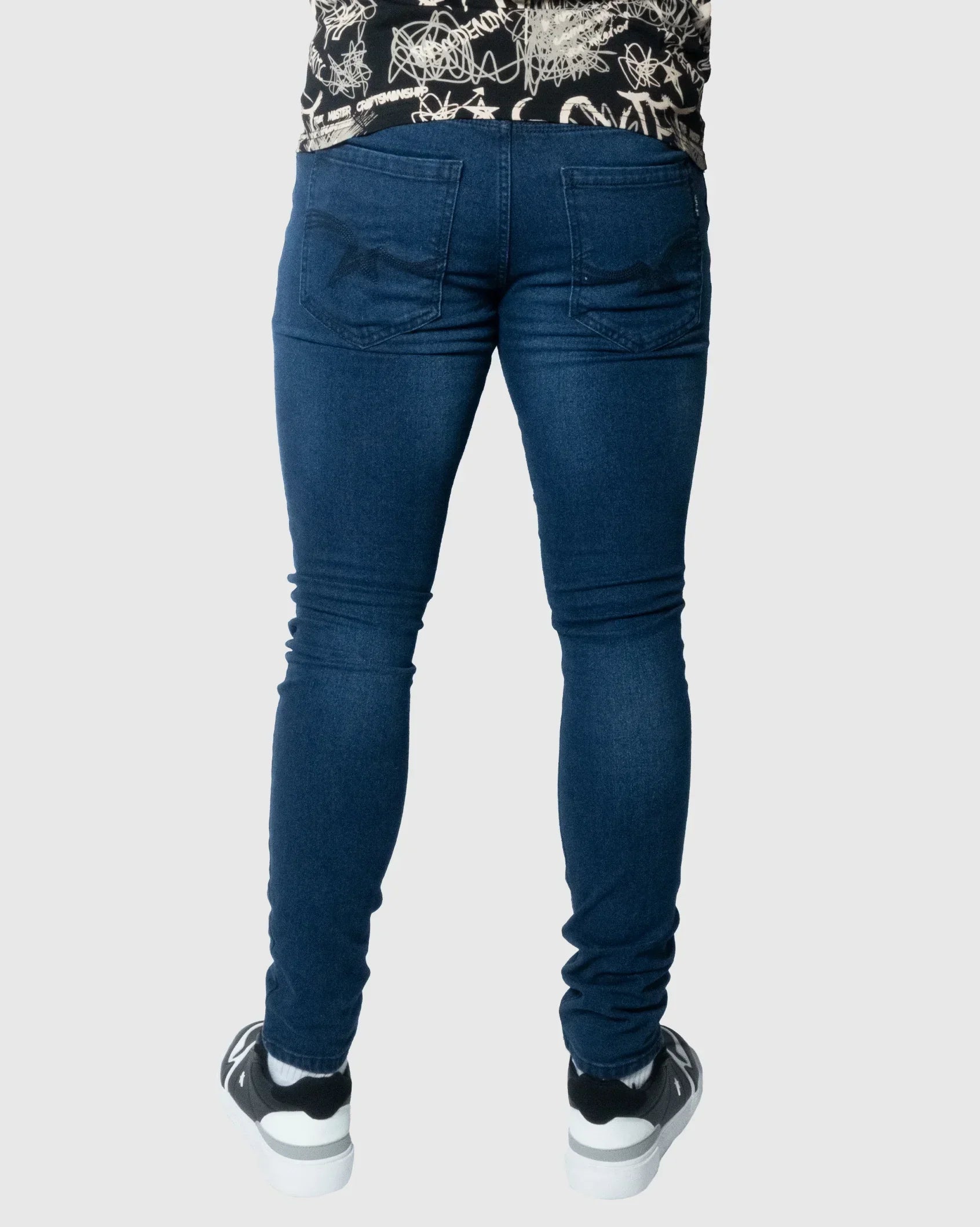 Soviet Mens Callahan #4 skinny jeans in dark denim, slim fit with classic five-pocket design, shown on a model.