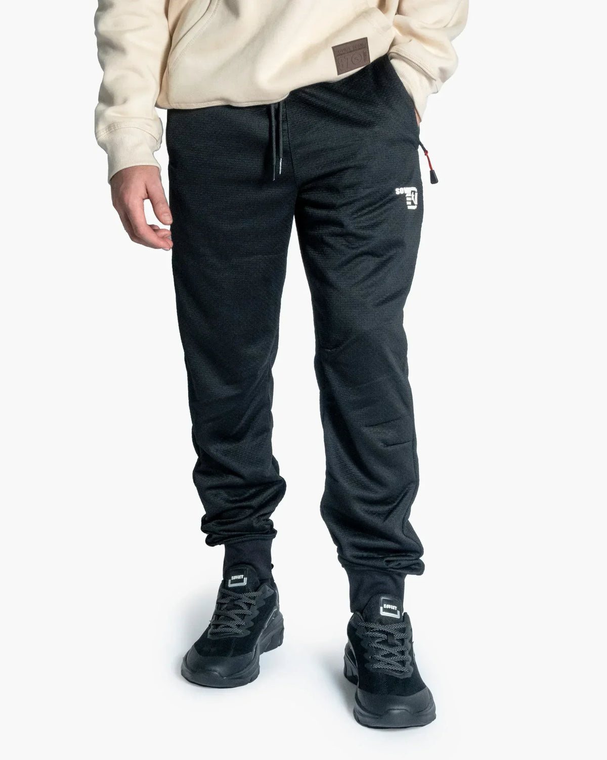 Soviet men's lightweight comfort jogger pants, casual athletic apparel with elastic waistband and tapered fit, in neutral color.