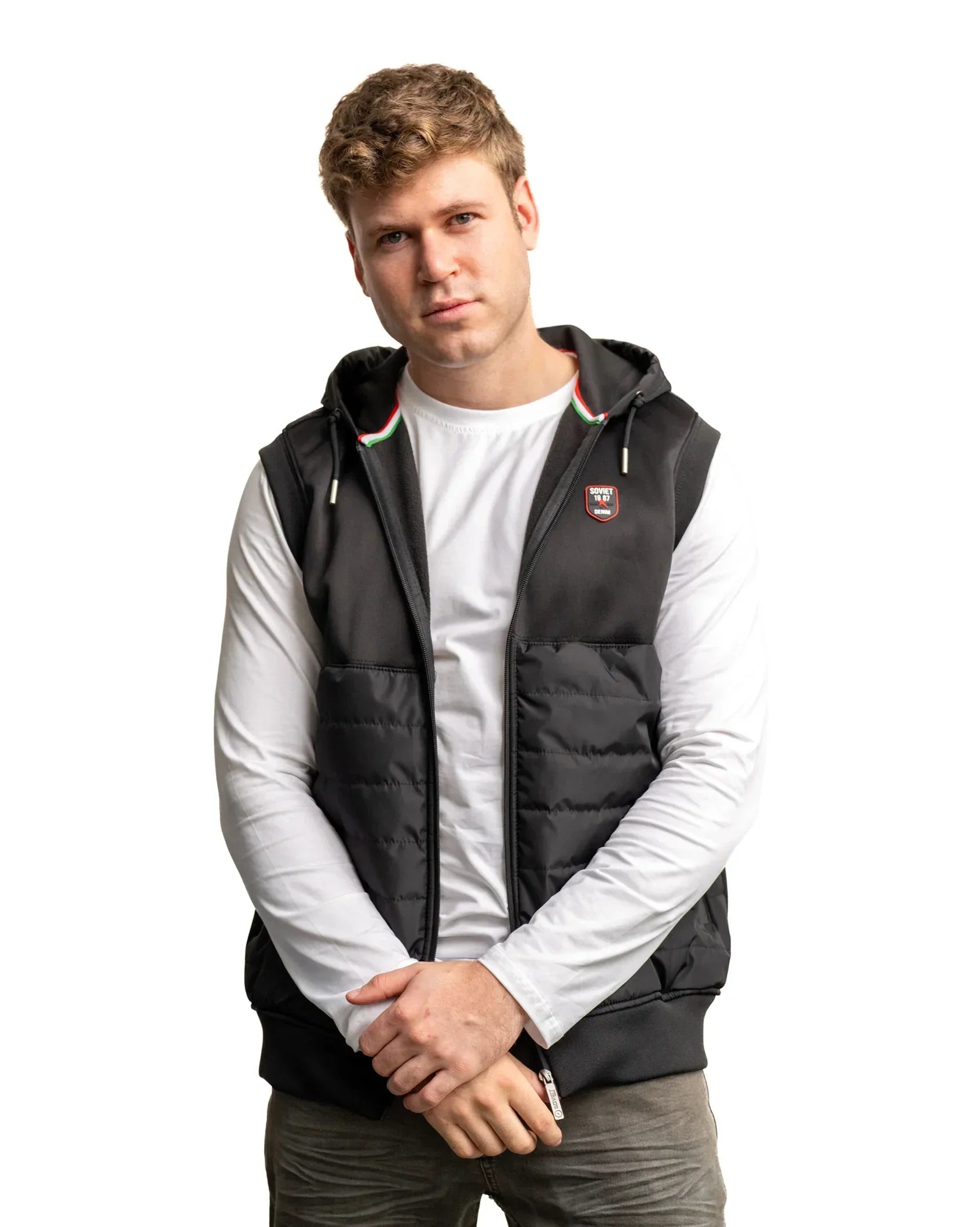Black padded hooded gilet with zip front and striped piping at hood opening