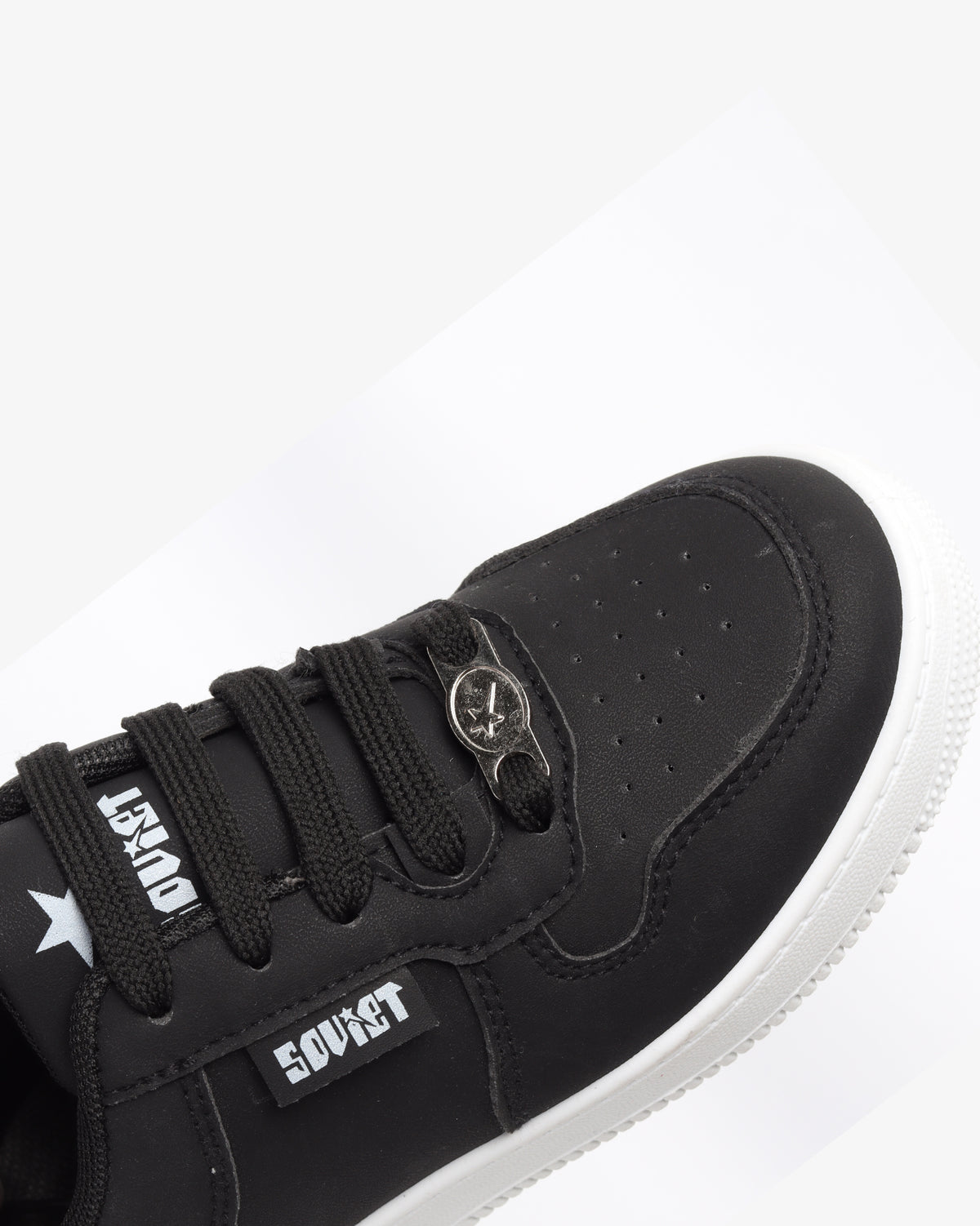 Black and white Soviet Youth Leandro low cut casual lace-up sneakers, showcasing stylish footwear design.