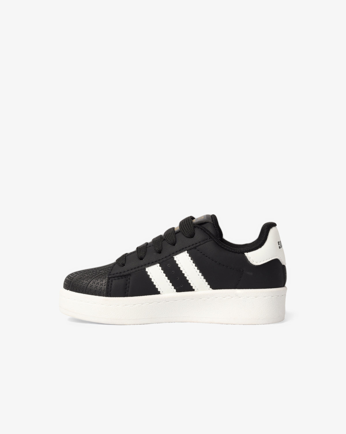 Youth Stargaze Platform by Soviet, black and white low-cut casual platform footwear with a chunky sole and sleek design.
