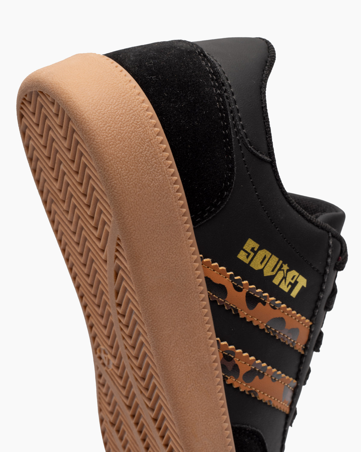 Soviet Ladies Ness low cut casual sneaker in black leopard print footwear with a sleek, stylish design.