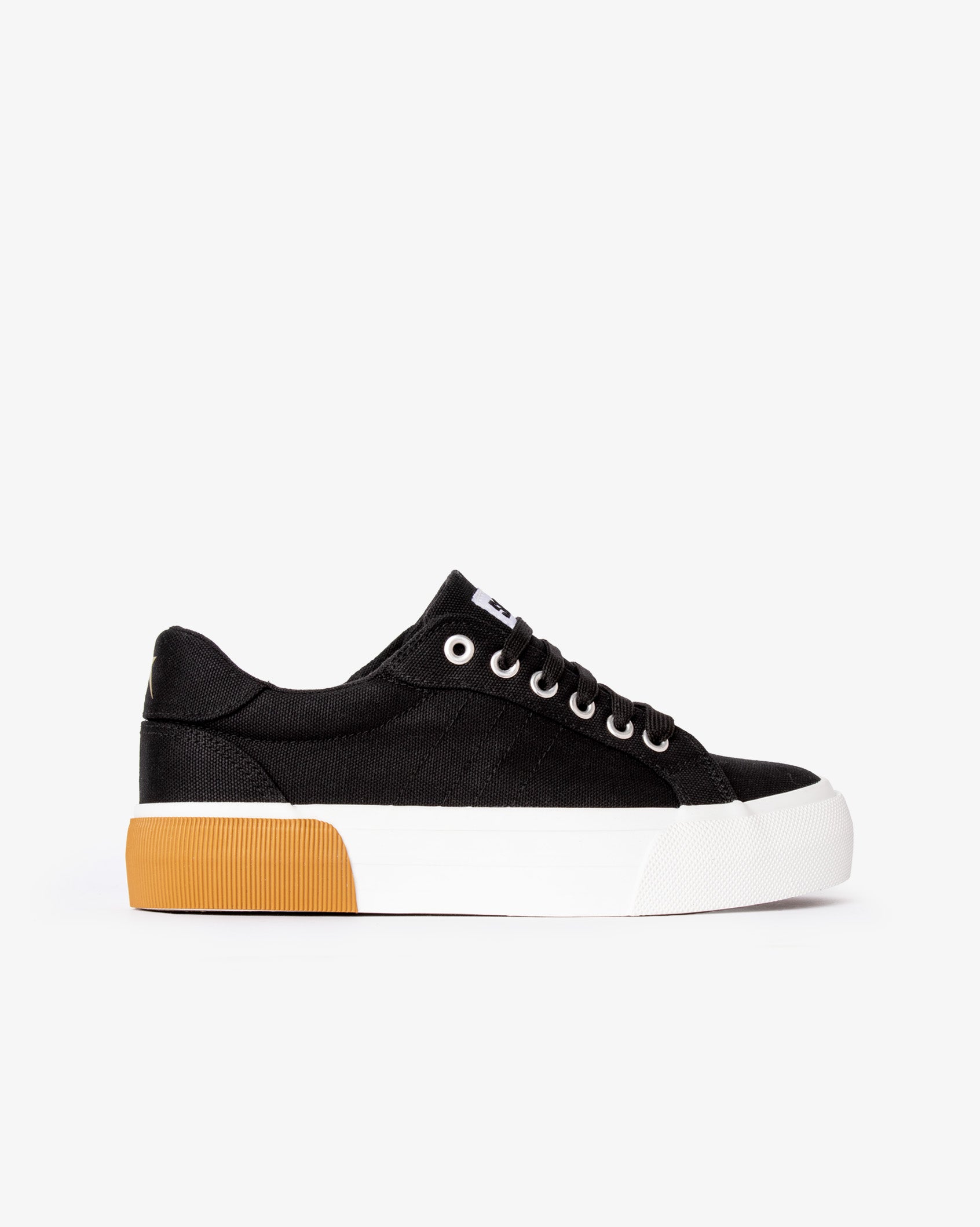 Black sneaker with a white sole and orange heel on a white background