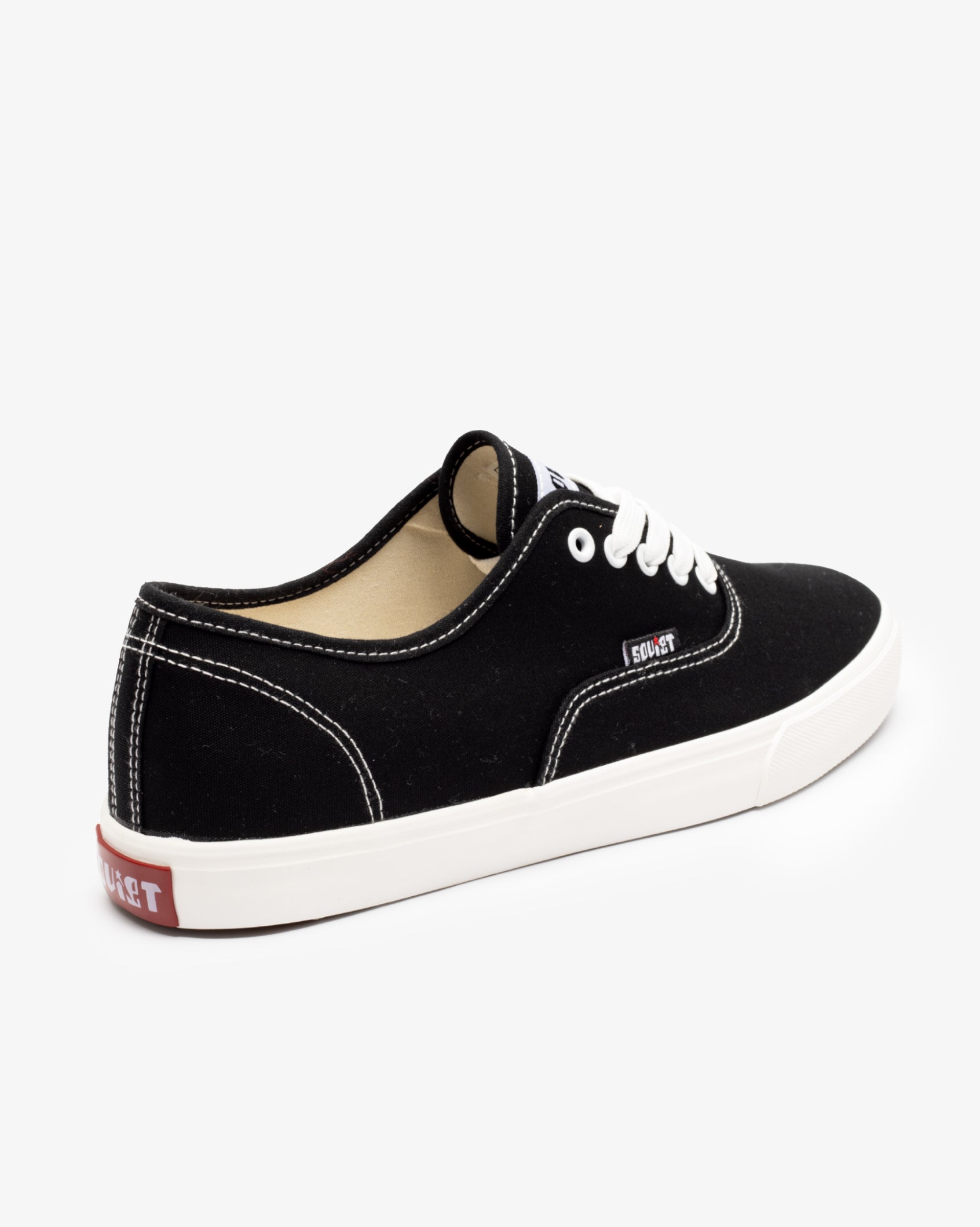 Men's low-cut canvas sneakers, black; side view with lace-up and white sole.