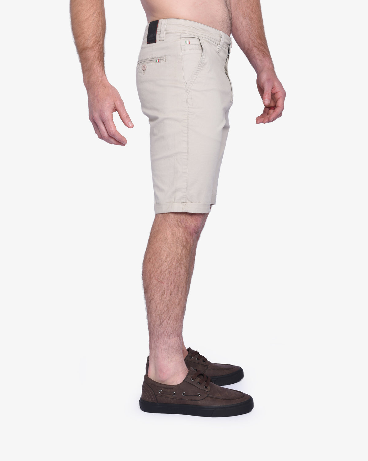 Men's Femicino chino shorts by Soviet, light stone color, casual fit, shown on a model with pockets and rolled hems.