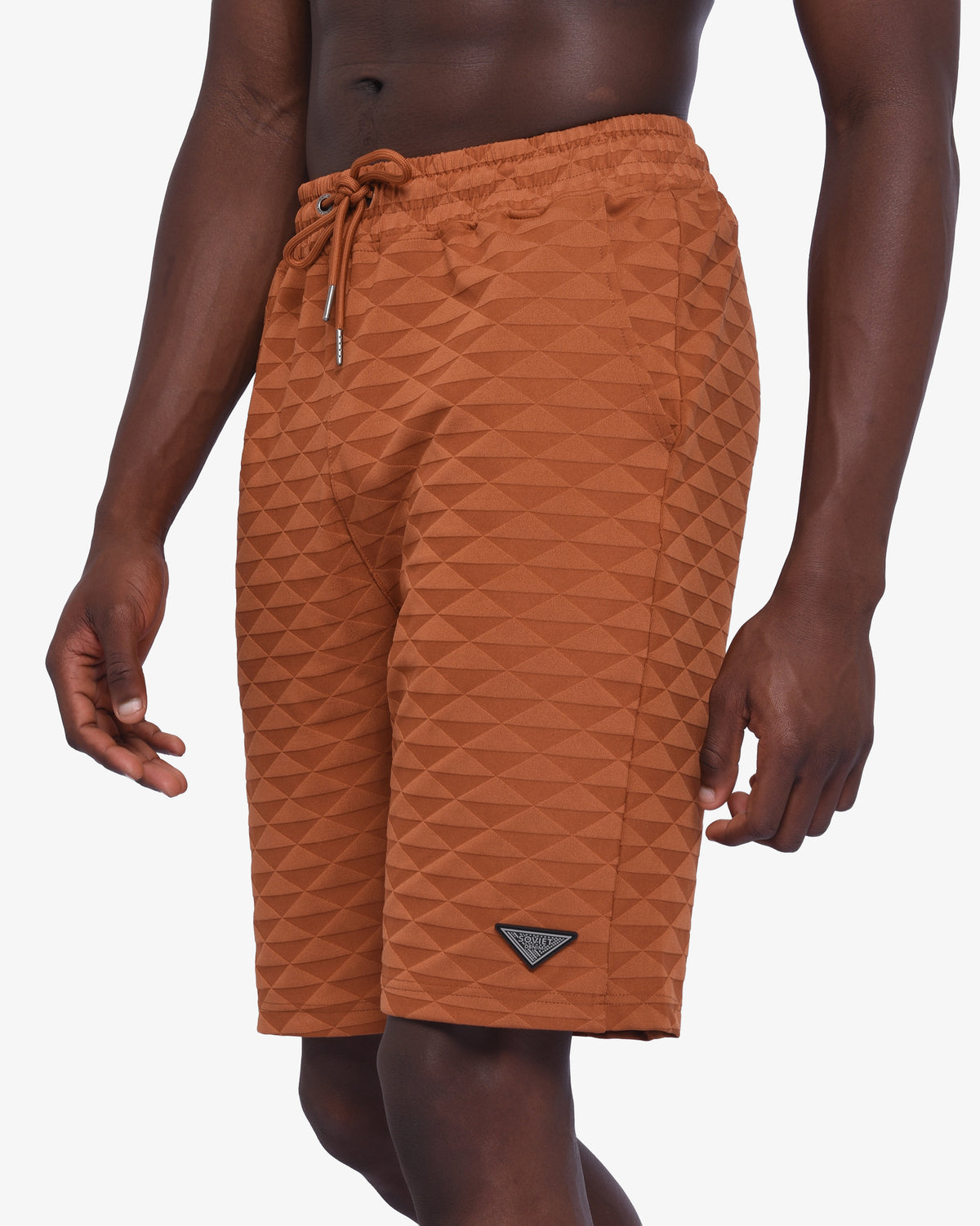 Mens Soviet Ford track shorts in caramel color, featuring athletic design and breathable fabric for active wear.