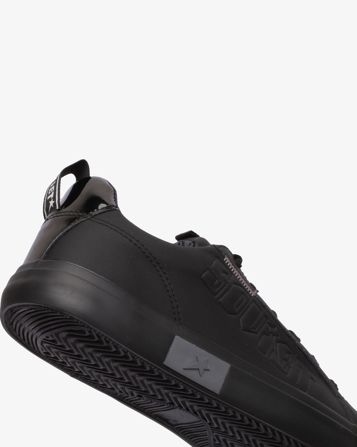 Men's Soviet Hollywood low cut PU sneaker in black with mono character design, showcasing stylish footwear with a sleek silhouette.