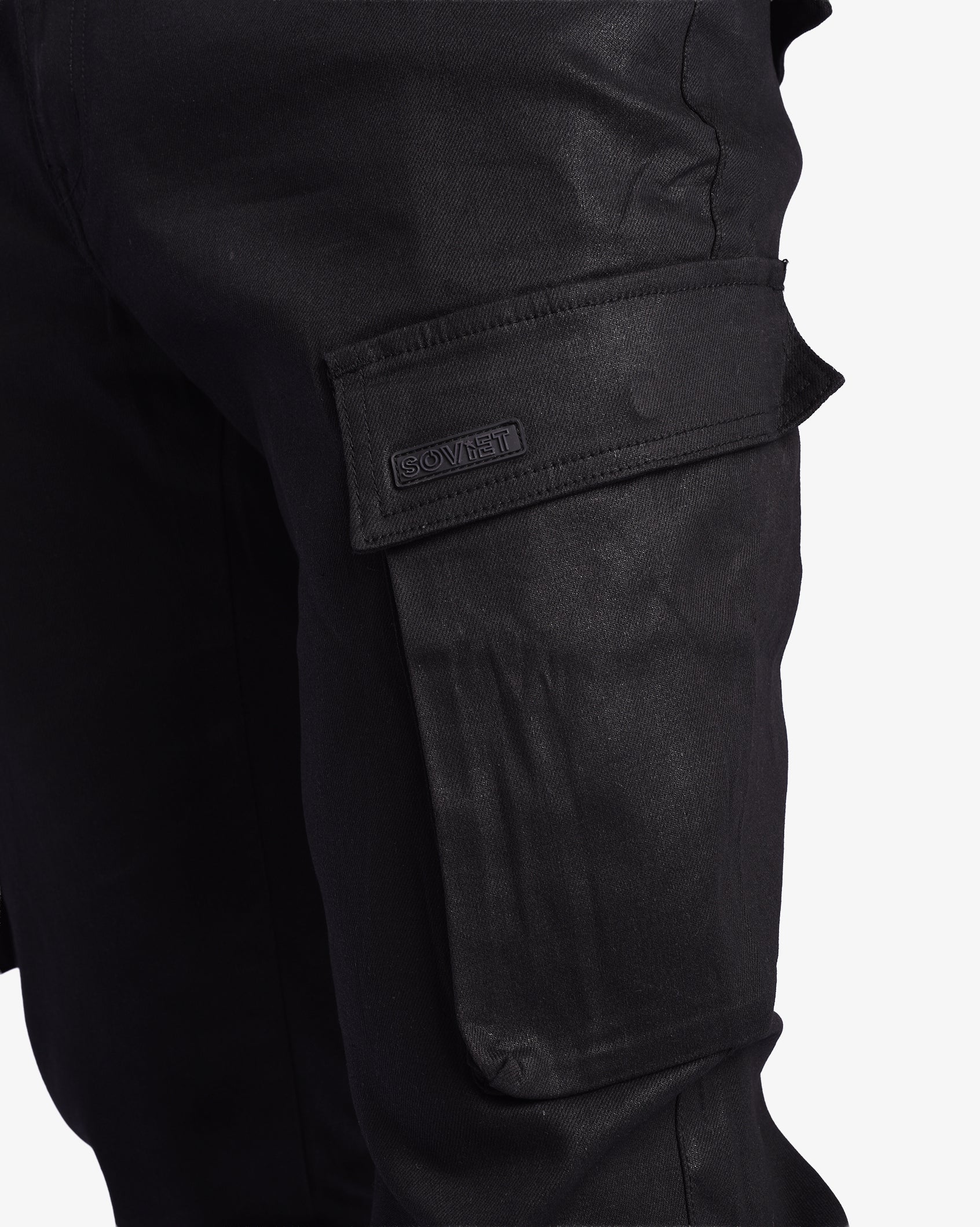 Men's Soviet Jerry wax finish denim cargo pants shown in black, featuring rugged design and multiple cargo pockets.