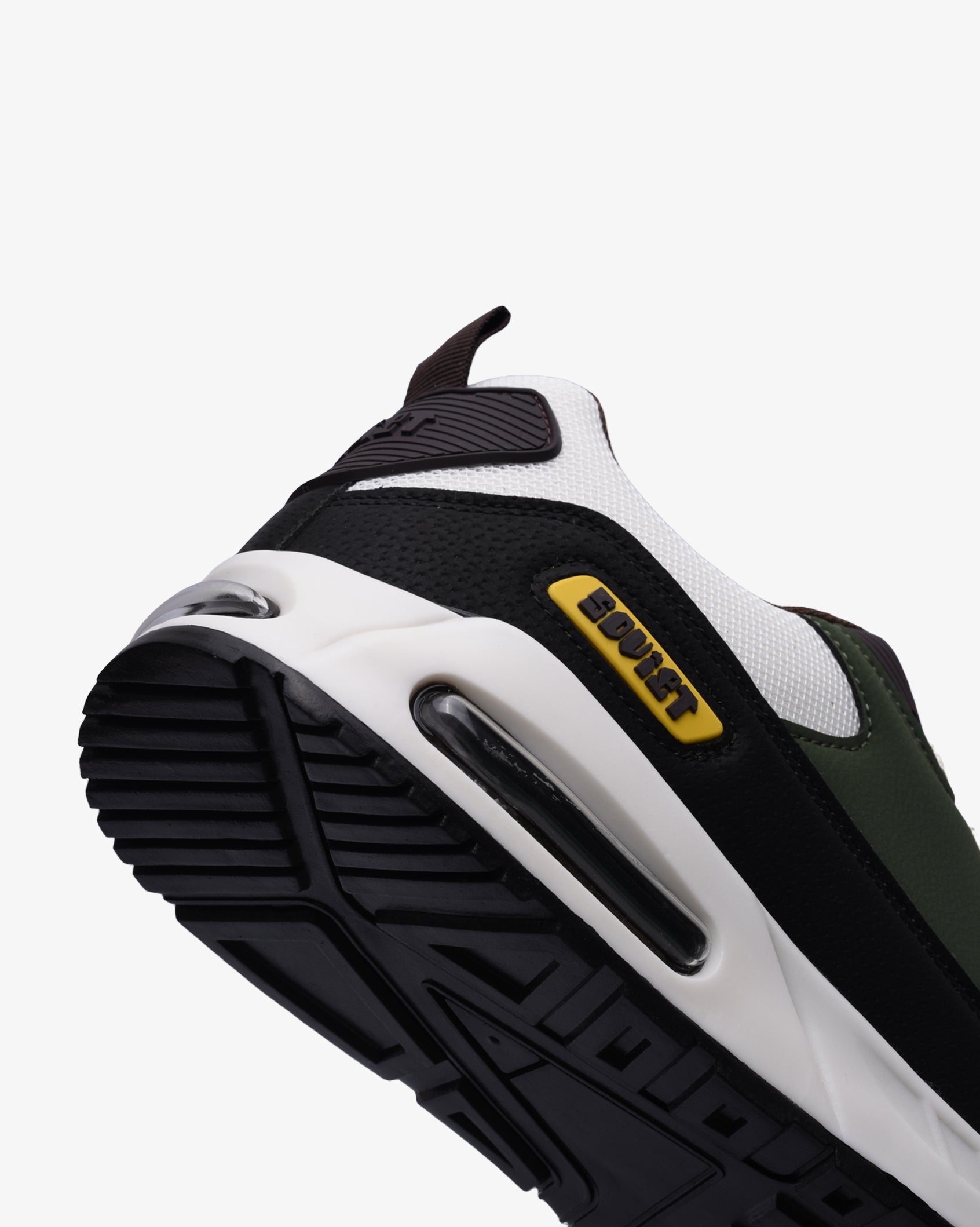 Men's Kirk Airbubble sneaker outsole view, black and white upper with green detail