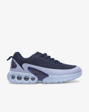 Men's Soviet Rhapsody mixed media upper sneaker in navy and grey, showcasing stylish footwear with textured design details.
