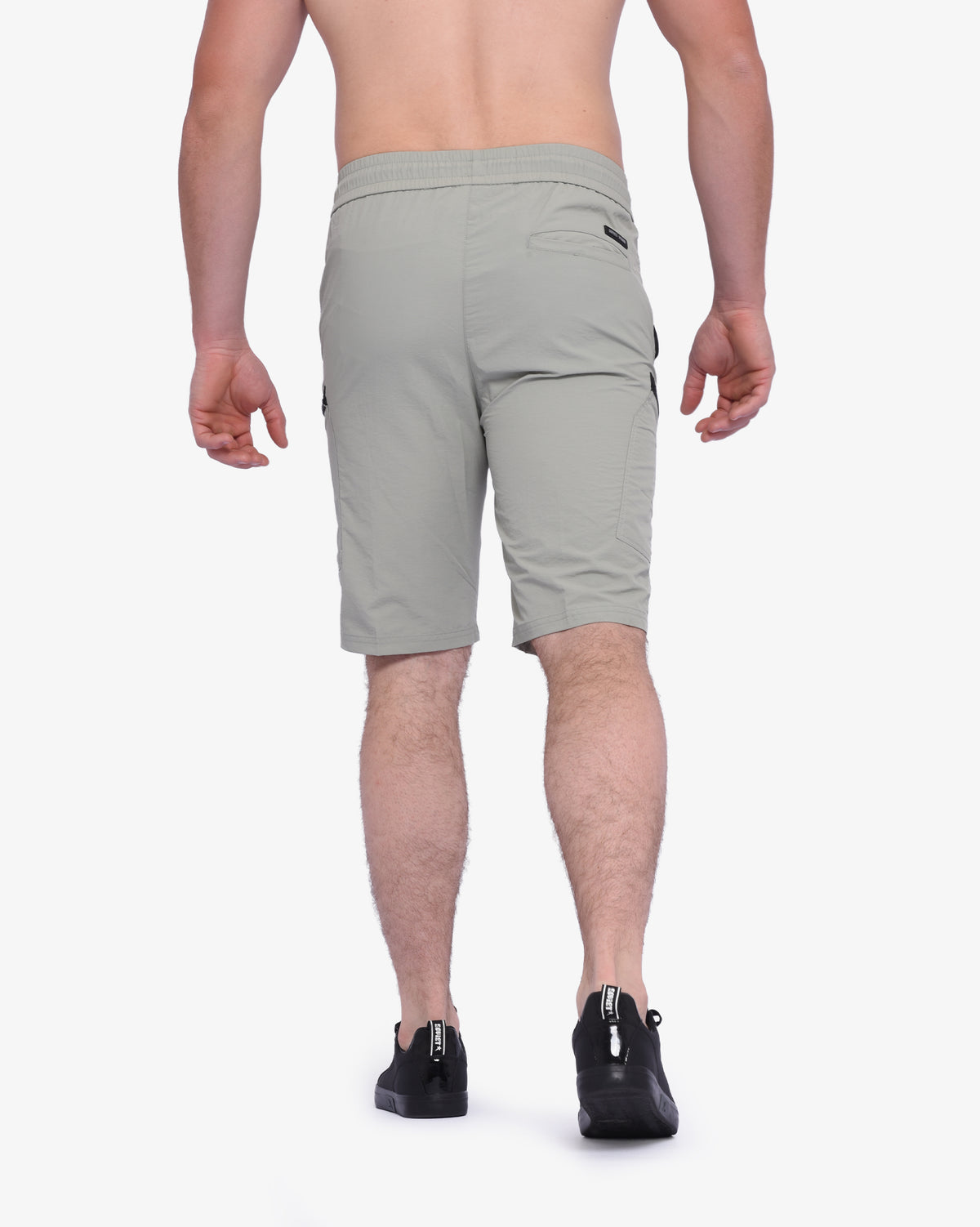 Men's Soviet Roshi track shorts in sage green, lightweight athletic apparel with an adjustable waistband and side pockets.