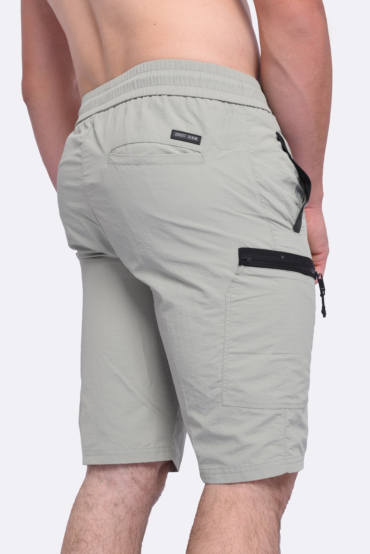 Soviet men's Roshi track shorts in sage green, lightweight athletic apparel with an elastic waistband and side pockets.